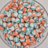 Coral and Teal Aztec 9mm Print Silicone Bead